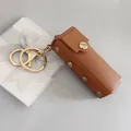 Petit étui à rouge à lèvres en cuir marron avec porte-clés doré élégant et chic - Pochette pour Rouge à Lèvres / Marron