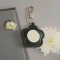Portable black flower-shaped PU leather mirror keychain with metal clasp for bags - Black-Silver Buckle