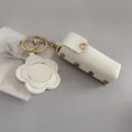 Pochette à rouge à lèvres blanche en cuir avec porte-clés miroir en fleur - Sac à Rouge à Lèvres Avec Miroir / Blanc