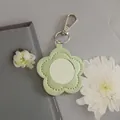 Mint green flower-shaped PU leather keychain with a built-in portable makeup mirror - Grass Green-Silver Buckle