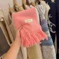Soft pink knitted scarf with tassels and decorative brand tag for winter cozy style - 194cm / Peach Pink
