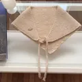 Elegant beige knitted triangle scarf for winter warmth featuring a decorative wooden button - 65cm / Beige