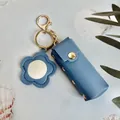 Porte-rouge à lèvres en cuir bleu avec un porte-clés miroir élégant en forme de fleur - Sac à Rouge à Lèvres Avec Miroir / Bleu