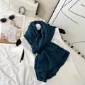 Elegant dark teal micro-elastic wrinkled scarf styled with white top and trendy bag - Teal Green