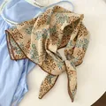 Macro view of cotton floral square scarf featuring blue leaf patterns and delicate lace edges - Brown Crochet Edge Scarf / Khaki Leaf