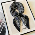 Elegant black silk square scarf with white paisley pattern tied in a stylish knot - Paisley Square Scarf / Paisley Cashew Print