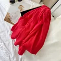Premium solid red crinkled cotton blend long scarf with elegant textured finish. - Red