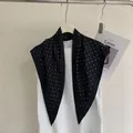 Elegant black polka dot triangular silk scarf for a classic neckerchief look - 132cm / Black Polka Dots