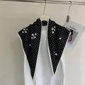 Elegant black triangular silk scarf featuring classic white polka dots and delicate floral prints - 132cm / Black Polka Dot Floral