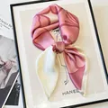Elegant pink floral silk square scarf for women, tied in a stylish knot detail - Pink White Floral Necktie / Pink Peony Print