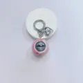 Gothic style horror eyeball keychain with silver heart charm on pink marble bead accessory - Red Blood Veins Grey Eye