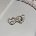 Macro view of silver heart-shaped glasses hair clip encrusted with sparkling rhinestones - Heart Glasses Shape (White Rhinestone)