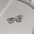 Detailed view of an elegant silver hair clip shaped like spectacles with rhinestones - Square Glasses Shape (White Rhinestone)