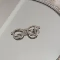 Sparkling rhinestone eyeglasses hair clip detail showing silver finish and crystal gems. - Round Glasses Shape (White Rhinestone)