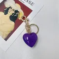Purple glitter heart-shaped keychain accessory with shiny gold metal lobster clasp - S / Purple