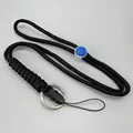 Adjustable black paracord neck lanyard featuring blue toggle bead and silver metal ring - Black