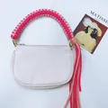Hand-woven pink paracord bag strap accessory for crossbody or handheld bag modification - Pink And Rose Red