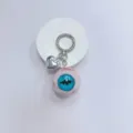 Gothic horror eyeball keychain featuring a blue pupil and silver heart charm pendant - Red Blood Veins Blue Eye