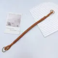 Hand-woven brown PU leather bag handle strap featuring gold metal rings for handbags - Tan