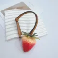 Realistic strawberry bag charm with brown leather strap, cute 3D fruit accessory - Gradient Red Strawberry