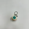 Gothic style keychain featuring a realistic eyeball pendant and small silver heart charm - Cream Ball Blue Eye