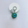 Gothic green eyeball keychain featuring a horror theme with silver heart charm and ring - Green Ball Blue Eye