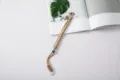 Woven parcord wrist lanyard in khaki with decorative blue bead for phone or camera - Brown Rope + White Rope + Gasket