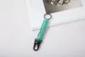 Handmade paracord survival keychain with black eagle beak carabiner in mint green - Light Blue