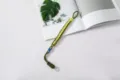Hand-braided olive green and yellow paracord wrist strap for mobile phones and cameras - Green Rope + Yellow Rope + Gasket
