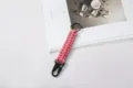 Pink 7-strand paracord braided keychain with black metal eagle claw hook for outdoor - Pink