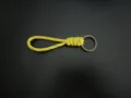 Minimalist yellow woven rope keychain with reflective grey stripes and metal ring. - Yellow With Bronze Ring
