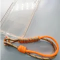 Woven paracord phone wrist strap in orange and beige with orange metal ring buckle - Orange Ring & Patch / Brown & Orange