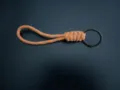 Reflective orange paracord keychain with a black metal ring - Orange With Bronze Ring