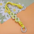 Woven paracord daisy wrist lanyard in vibrant yellow and white variant - Spring Ring and Patch Style / Yellow + White