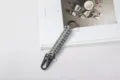 Handmade grey paracord keychain with matte black eagle beak clip for outdoor survival - Light Gray