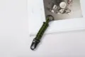 Handmade army green paracord braided keychain with a durable black metal eagle-mouth clasp - Army Green