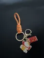 Handmade orange woven wristlet keychain with lucky cat and fortune charms - Lucky Cat (Dreams Come True) / Orange
