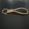 Handmade khaki woven paracord keychain with durable silver metal ring for car keys - Camel