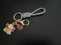 Handmade braided grey wrist strap keychain with lucky cat and blessing charm - Silver Gray