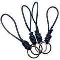Hand-woven wax rope keychain strap with minimalist metal rings in various finishes - Black