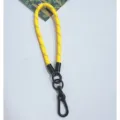 Detailed view of a yellow braided wrist strap featuring a sturdy black metal clasp for keys - Yellow Style / Approx. 21cm