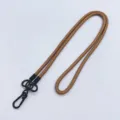 Durable tan braided phone lanyard with black metal clasp for crossbody and neck use - Brown