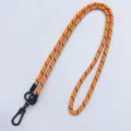 Durable orange crossbody phone lanyard with black lattice pattern and metal hook. - Orange
