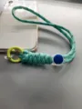 Adjustable braided teal phone wrist strap with yellow clip and blue adjuster. - Light Blue Rope + Yellow Spring Ring