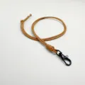Durable brown wax rope lanyard featuring a sleek black metal swivel snap hook for ID cards - Brown