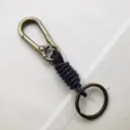 Vintage alloy carabiner keychain featuring a hand-woven leather cord and circular ring - Bronze Carabiner + Black Rope + Bronze Key Ring