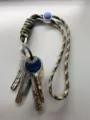 Adjustable camo paracord wrist lanyard with blue toggle for outdoor phone and keys - Camouflage Green Rope + White Spring Ring