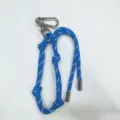 Stylish blue braided rope bag charm featuring adjustable knots and silver carabiner - Blue