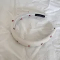 Close-up detail of a sweet white plaid fabric headband featuring red cherry embroidery - Light Yellow Cherry Headband / 3CM Wide