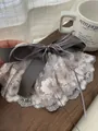 Detailed macro view showing grey ribbon bow and intricate pink floral lace hair clip - Lace Spring Clip / Grey Embroidery